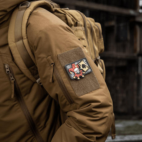 M-Tac Joker Skull 3D PVC on jacket sleeve with Velcro, tactical PVC design, perfect for customizing gear. Dimensions 78x55 mm.