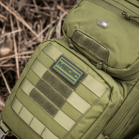M-Tac Medic PVC 3D on a backpack, flexible PVC material, 3D effect and Velcro fastening, ideal for medical personnel.