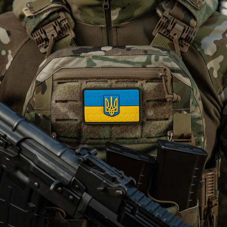 M-Tac Patch Ukraine Flag with coat of arms mounted on military gear, durable PVC with 3D-relief, perfect for clothing and backpack.