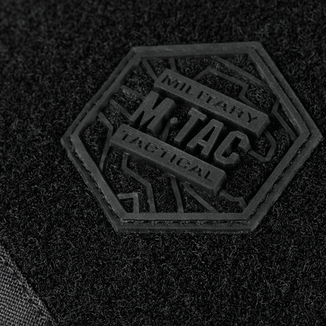 Close-up of M-Tac Sling Pistol Bag Elite Hex with Velcro in black Cordura fabric with military emblem.