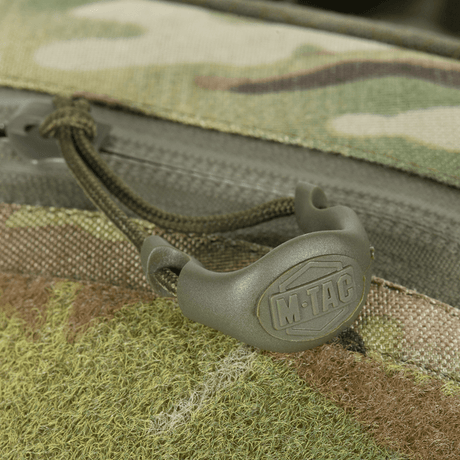 Detail of M-Tac Sling Pistol Bag Elite Hex with Velcro shown with camouflage pattern and M-Tac logo.