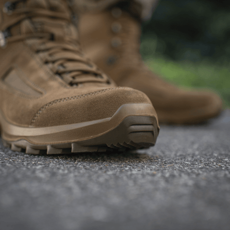 M-Tac Tactical Summer Boots on rough terrain, lightweight and durable, designed for warm days, made of leather and Cordura® mesh.