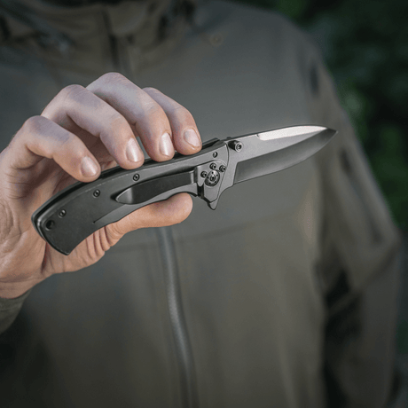 M-Tac Outdoor & Military folding knife - Type 7 held in hand, lightweight chrome stainless steel blade, black coating, tactical EDC knife.