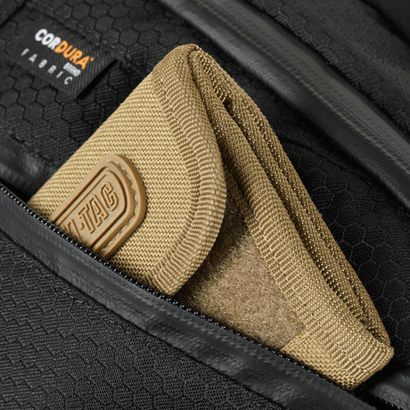 Detail of M-Tac Sphaera Hex Hardsling Bag Large Elite with beige wallet in CORDURA® lining.