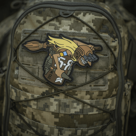 M‑Tac Patch Baba-Yaga Horizontal on a camouflage backpack, with 3D design of Baba Yaga with night-vision and grenades. PVC material, 9x13,5 cm.