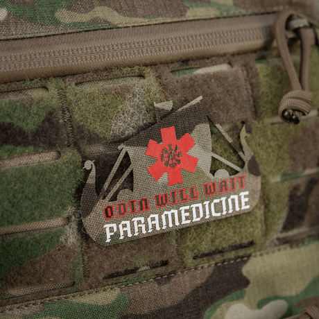 M-Tac Patch Viking Evac with Viking ship and 'Odin Will Wait Paramedicine' text on a camouflage background.