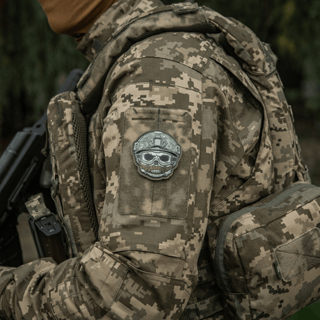M-Tac Patch Emoji #4 on a camouflage jacket with Velcro, fun morale patch with 3D effect. Suitable for gear or clothing. PVC material.