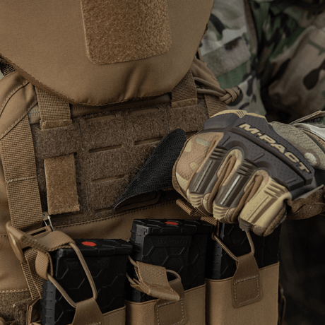 Soldier wearing tactical vest with M-Tac Patch Lucky Card (Embroidered) attached to Cordura 500D fabric via Velcro.