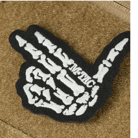 M-Tac Bat Wing Bag Elite Hex with skeleton hand-drawn embroidery in black and white on durable fabric.