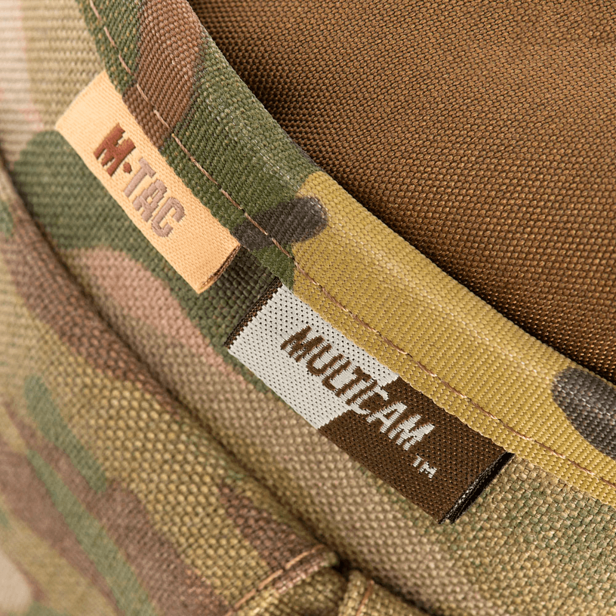 M-Tac Mag Drop Pouch Elite i camouflagedesign med MOLLE-fastgørelser, ideel til hurtig magasinudskiftning under nødgenladning.