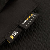 Nærbillede af M-Tac Double Mag Pouch Hook Backed Magazine med Cordura-stofmærke