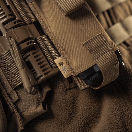 M-Tac Elastisk Tourniquet Pouch Molle Gen.III med Cordura design og elastik til hurtig adgang, marked med M-Tac logo, nærbillede.