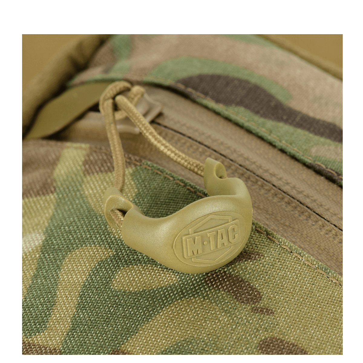 M-Tac Sling Pistoltaske Elite Hex med holdbart Camouflage Cordura og YKK lynlås til sikker våbentransport.