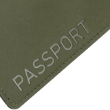 M‑Tac Pascover i polymerkomposit med "Passport"-tryk på forsiden, designet til at beskytte pas mod slid og skader under rejser.