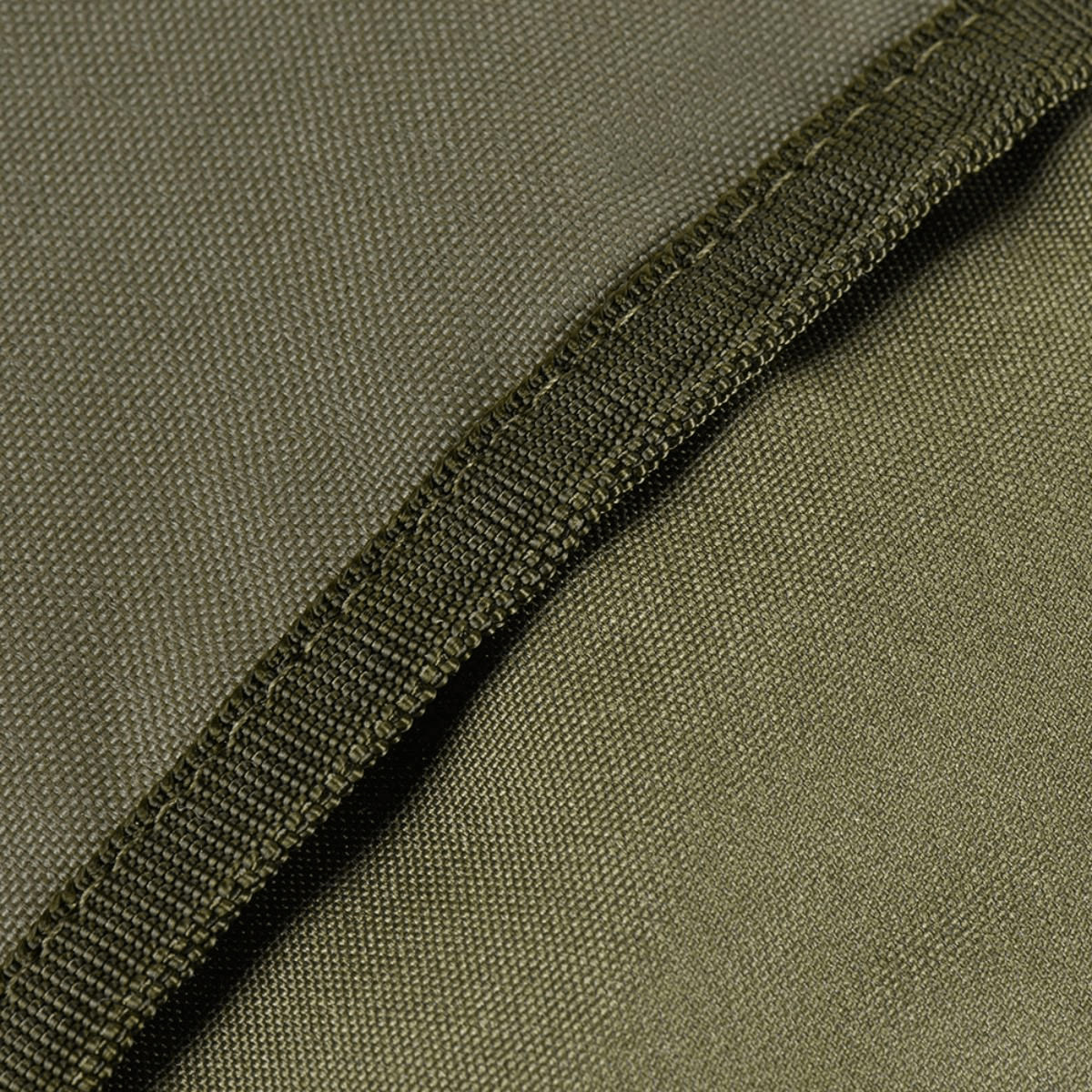 Nærbillede af M-Tac Pouch Sukharka Gen.3 XL'ens slidstærke Cordura 500D materiale i olivengrøn farvetone.
