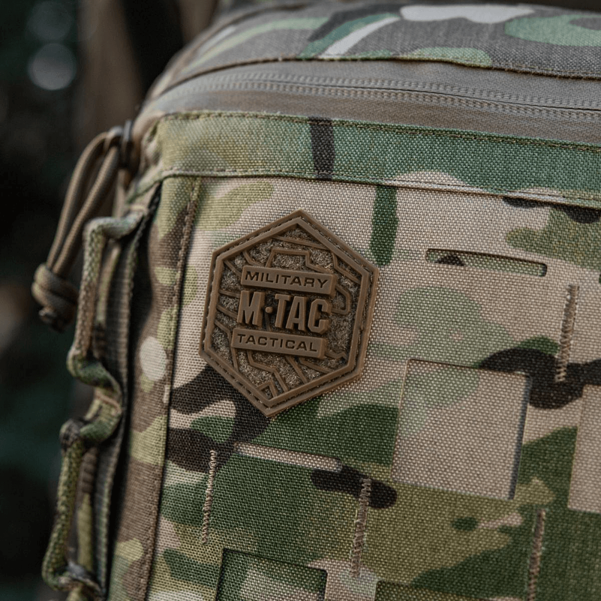 M-Tac Tablet Bag Laser Cut Hex in camouflage Cordura with hexagon patch and MOLLE system for tactical gear.