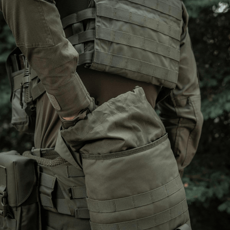 Soldier using M-Tac Sukharka Gen.3 Pouch with MOLLE attachment on field gear