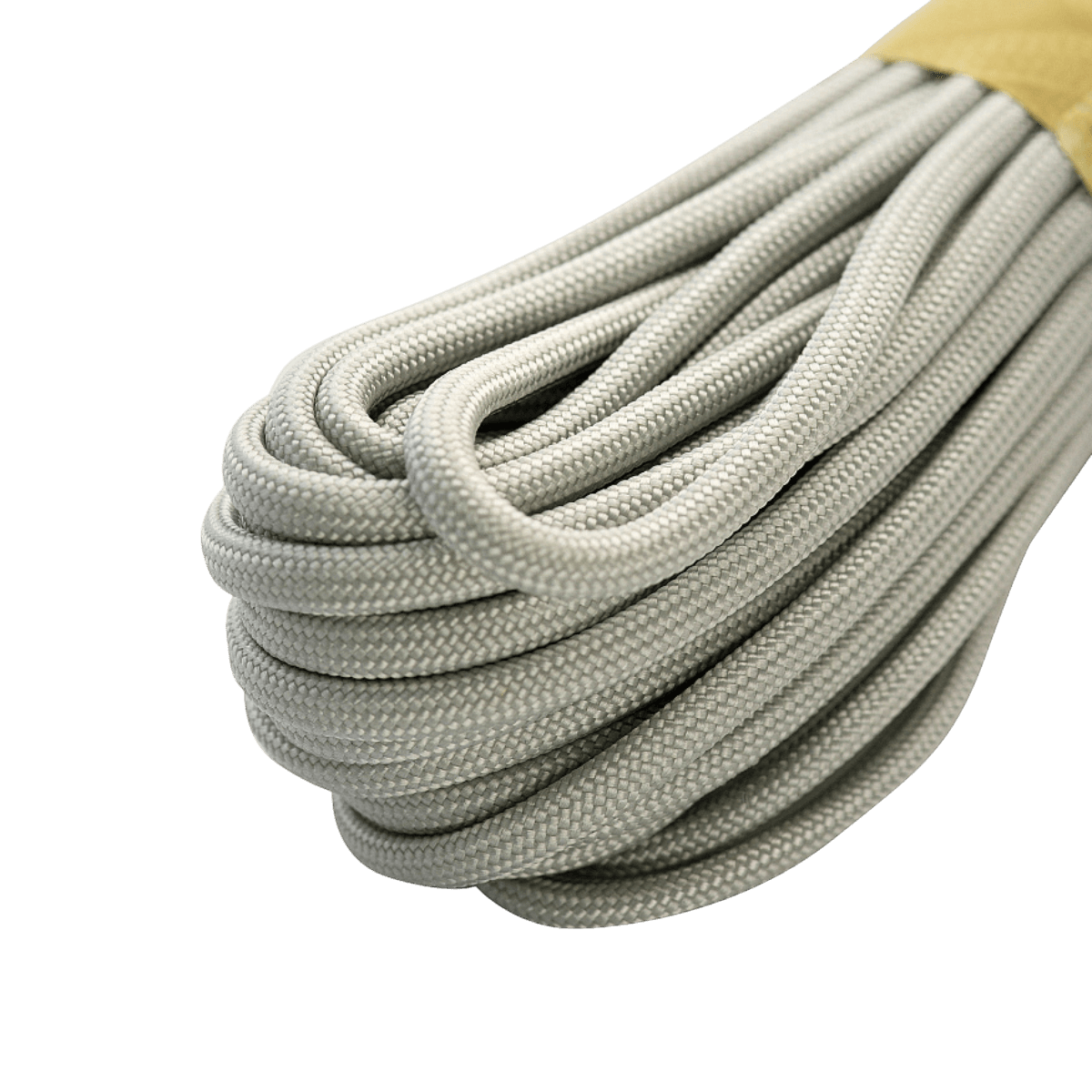 Grå M‑Tac Paracord 550 Type III 15 m nylonkordel, ideel til friluft, reparationer og nødbrug, med en brudstyrke på 240 kg.
