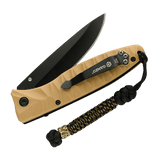 M-Tac Knife Lanyard Scandinavian Granule på en foldet lommekniv med flettet paracord og sort knivblad.