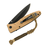 M-Tac Knife Lanyard Scandinavian Granule attached to a tan folding knife, showcasing a braided paracord design for easy access.