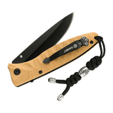 M-Tac Zeus Stainless Steel Lanyard på en kniv, dekoreret med rustfri stålkugle, flettet paracord til hurtig tilgængelighed og anvendelighed.