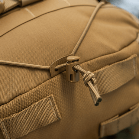 Nærbillede af M-Tac Rygsæk Sturm Elite Gen.II med elastisk snøring og MOLLE system, fremstillet i slidstærkt Cordura materiale.