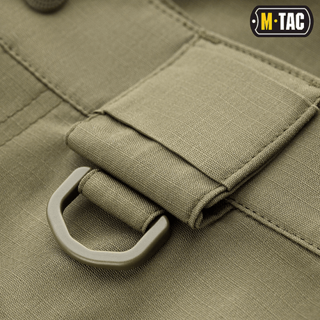 Detalje af M-Tac Shorts Aggressor Short med taktisk D-ring i elastisk polycotton flex rip-stop materiale.