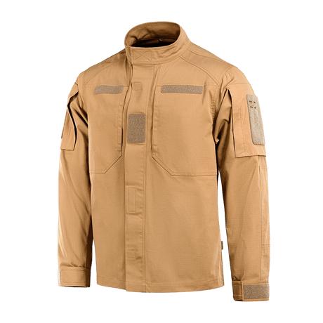 M-Tac Jakke Patrol Flex i beige med lodrette brystlommer og velcro-paneler, designet til taktisk brug med komfortabelt snit.