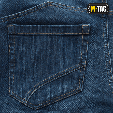 M-Tac Tactical Gen.I Regular Fit jeans, close-up view of back pocket design, blue denim texture, dansk.