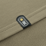 Nærbillede af M-Tac Pullover 4 Seasons'etiket på minimalistisk, alsidigt design til helårsbrug. Materiale: 95% bomuld, 5% elastan.