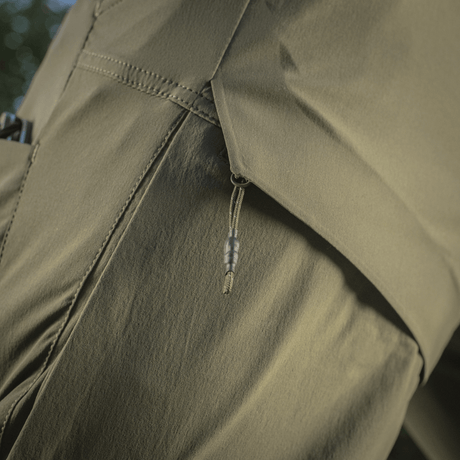 M-Tac Shorts Rubicon Flex cargo-lomme med YKK lynlås i mørk olivengrøn farve, designet til sommerbrug med 4-vejs stræk og vandafvisende materiale.