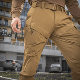 M-Tac Bukser Rubicon Flex i 4-Way Stretch stof, ideelle til træning og fritid, med innovativ cargo-lomme design.