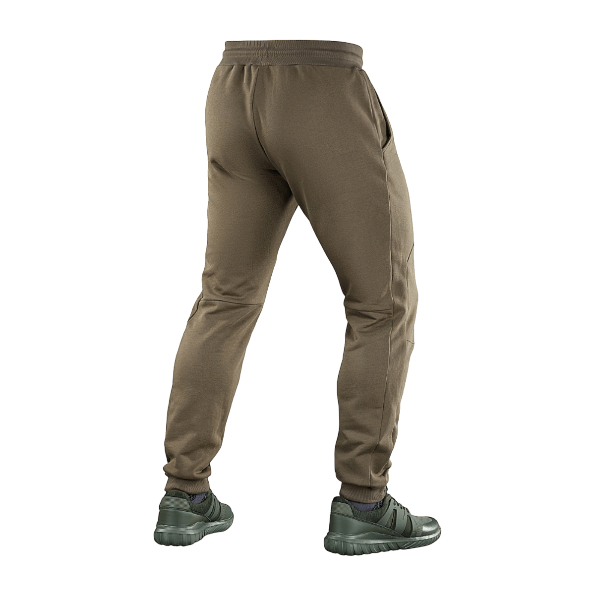 Man wearing M-Tac Bukser Stealth Cotton from behind, showcasing elastic waistband and pocket design. Perfect for sports and everyday wear.