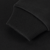 Detaljeret billede af M-Tac Sweatshirt Cotton Hard's ærmekant med ribkant i sort bomuld, der forhindrer kold luft i at trænge ind.
