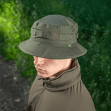 M-Tac Panama Rip-Stop hat with semi-stiff brim and ventilation, inspired by the Boonie model, worn outdoors.