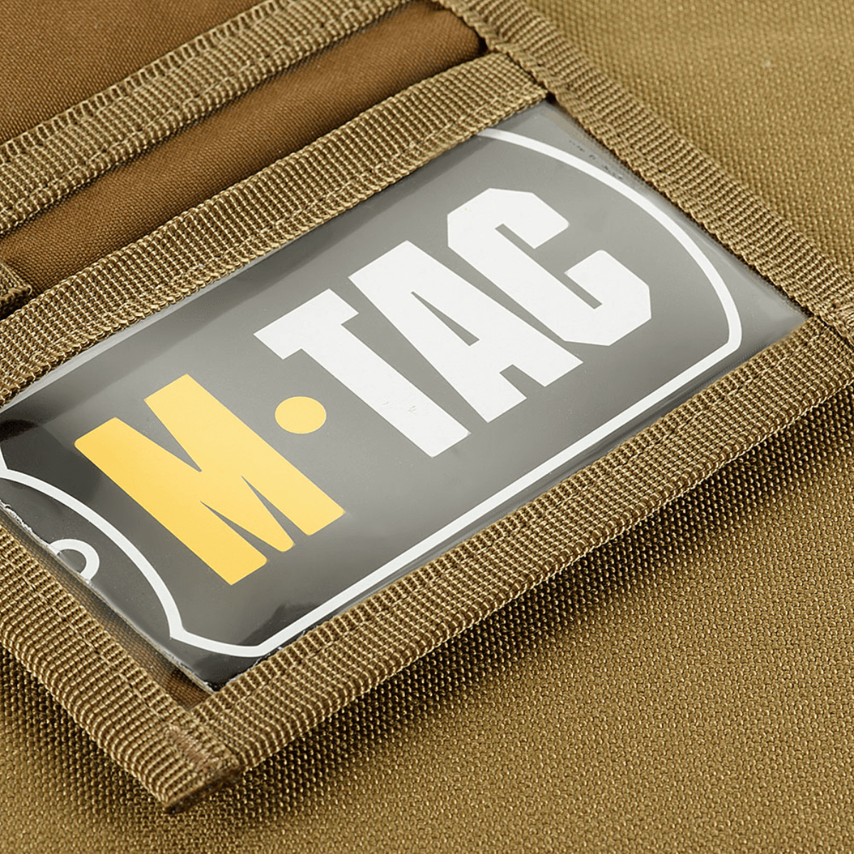M-Tac Pung Elite Gen.II med Cordura 500D konstruktion og YKK lynlåse, fremhæver robust og stilfuldt design med logo.