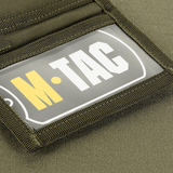 M-Tac Pung Elite Gen.II i slidstærkt Cordura 500D med stilfuldt M-Tac logo, rummelig design til kontanter og kort.