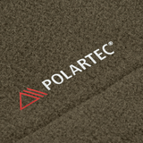 Detalje af Polartec® materiale fra M-Tac Sweater Nord Fleece Polartec Dame, der viser blød og holdbar tekstur.