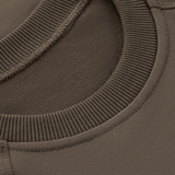 Nærbillede af M-Tac Raglan Logo med kamoflageprint og MagnaColours®-tryk, der sikrer farvebestandighed.