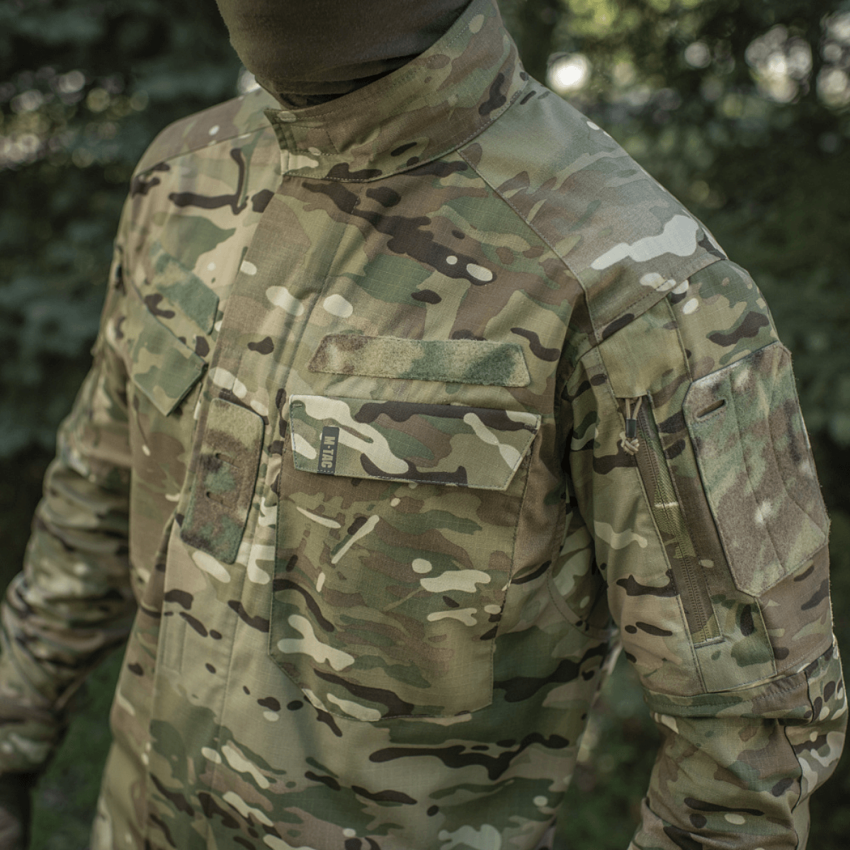 M-Tac Jakke Sturm Gen.II NYCO Extreme med Multicam camouflage, designet til taktisk brug og udendørs aktivitet.