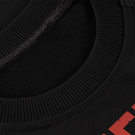 Sort krave på M-Tac Raglan Freedom trøje med detaljeret syning og premium MagnaColours® print for en aktiv livsstil.