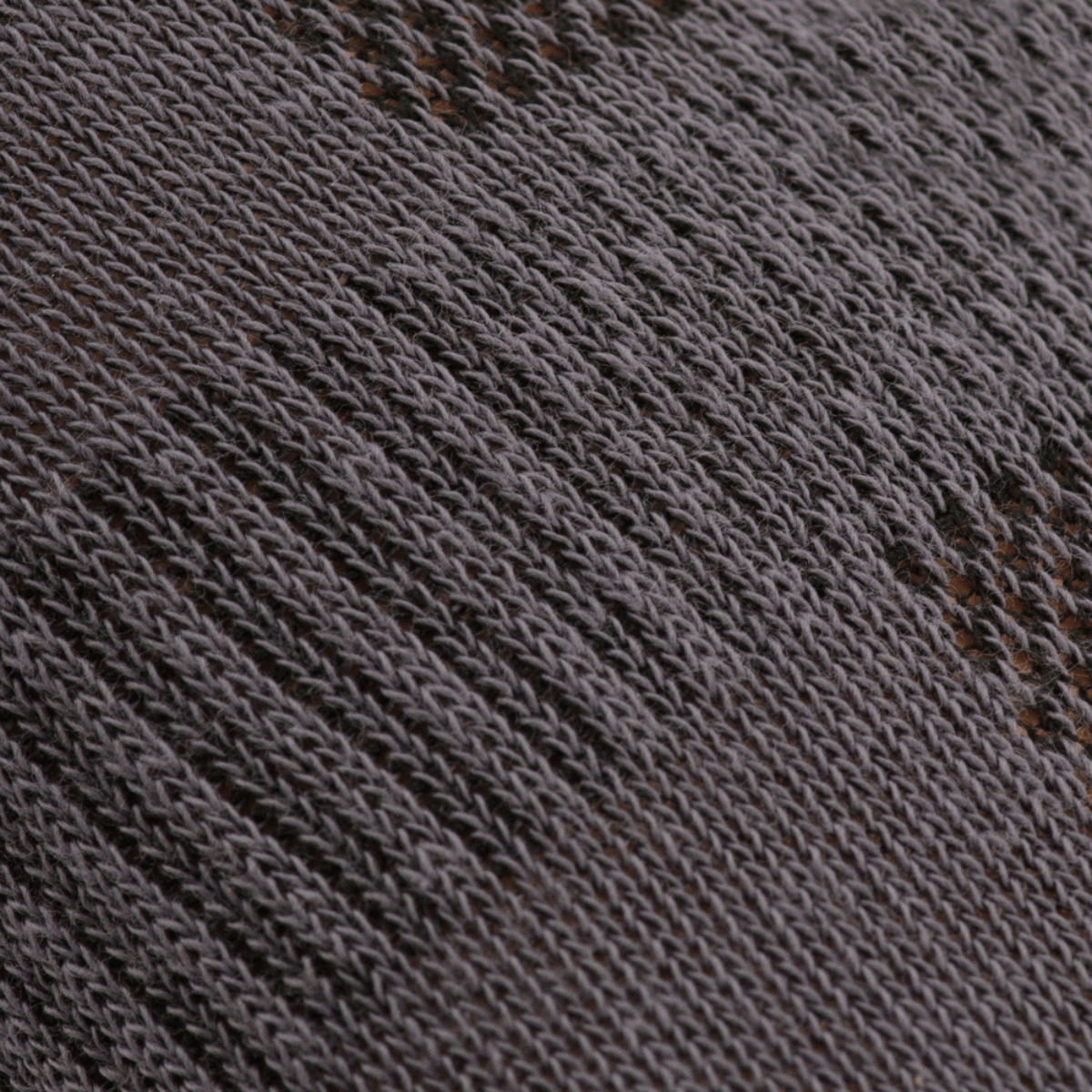 Nærbillede af materialet brugt i M-Tac Let Sommersokker, der fremhæver åndbarhed og ergonomisk design til løb og udendørs aktivitet.