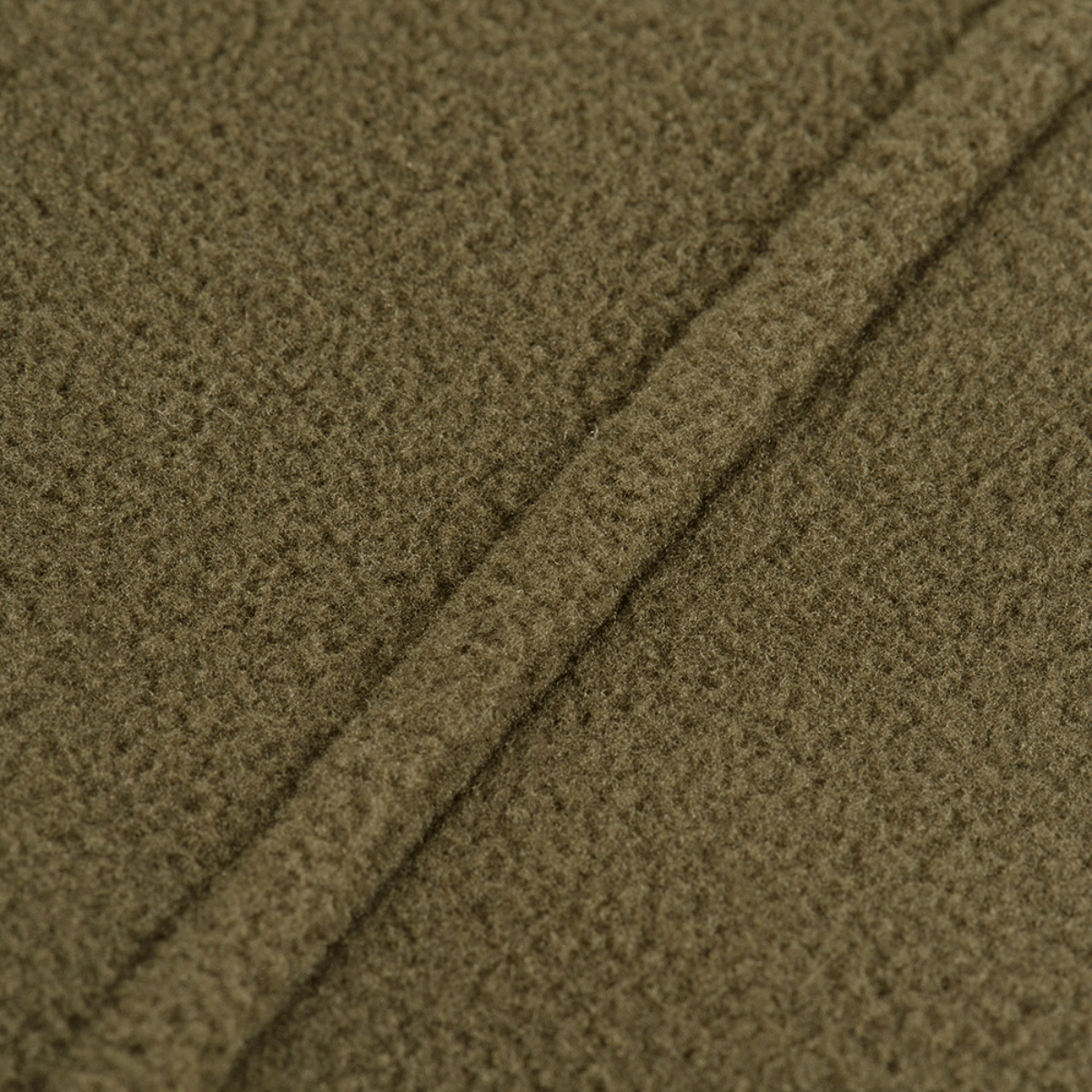 Nærbillede af stoffet på M-Tac Delta Polartec Fleecejakke, fremstillet af Polartec® Micro Series-fleece i 100% polyester.