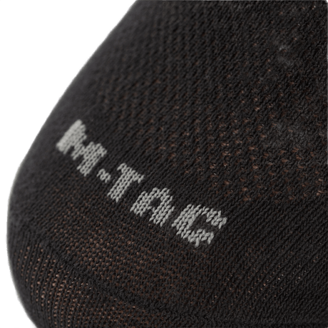 Sort M-Tac Let Sportsokker til løb og udendørsaktiviteter, med ergonomisk design og åndbart materiale.
