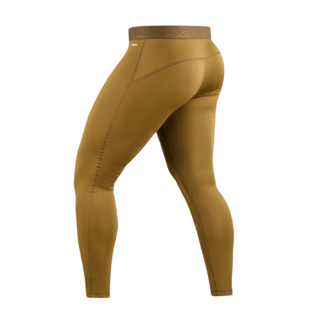 M-Tac Level I Polartec Thermal Bukser i brun, set bagfra, anatomisk pasform, baselayer til vinter og lavsæson.