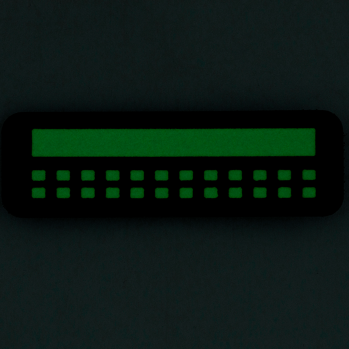 M-Tac Patch Flag 25x80 Mini Squares i grøn, lavet af slidstærk Cordura 500D med velcromontering.