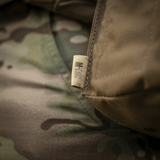 M-Tac Pouch til M249 Cartridge Box Closed i slidstærkt Cordura 500D-materiale, monteret på camouflagemønster.