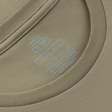 M-Tac T-Shirt Rex Team label med blå mærkning, der viser detaljerne om størrelse og materiale på kraven.