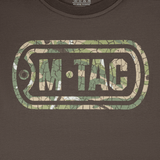 M-Tac T-Shirt Logo Long Sleeve med camouflage mønster, ikonisk M-Tac-logo og slogan "Born by Revolution – Hardened by War".