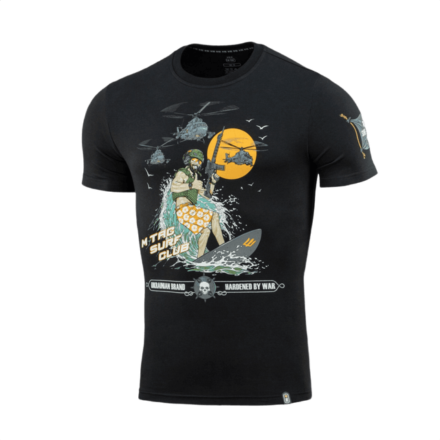 M-Tac T-Shirt Surf Club med design af soldat på surfbræt og helikoptere, inspireret af ukrainske specialoperationer og surfscener.